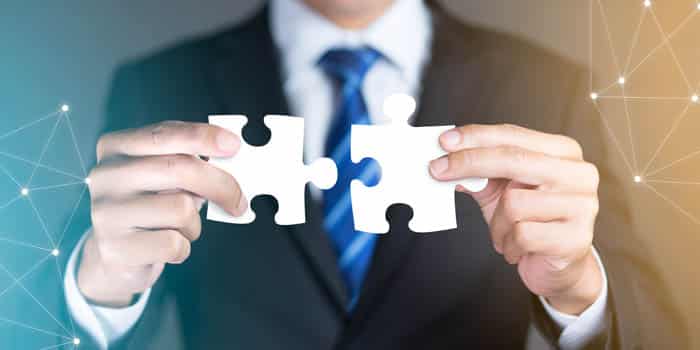 pieces-of-puzzle-joined-together-partnership-deal-m&a-acqusition-news